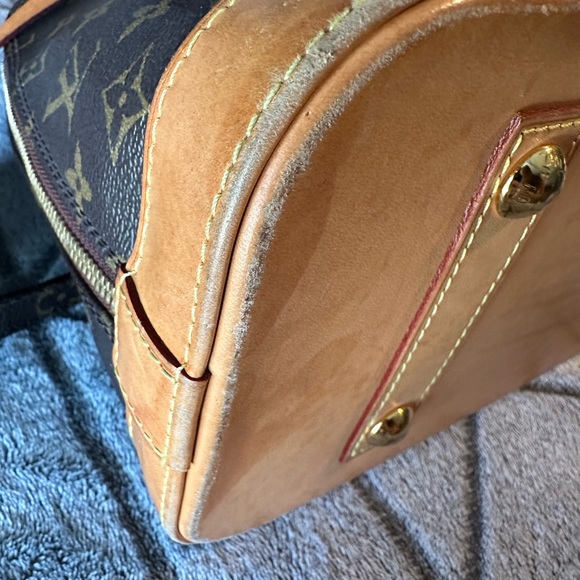 Authentic Louis Vuitton Monogram Alma satchel - Picture 7 of 13